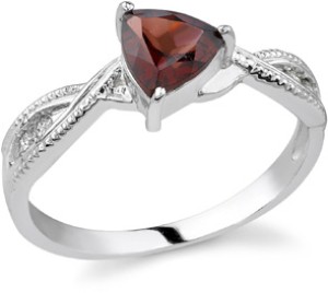 Silver and triangle garnet ring  on a white background