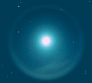 A photograph of the moon with a ring of white light around it set in a blue night sky 