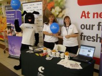 Jet holds balloons at WA ScamNet launch in Geraldton