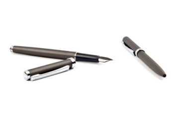 Two fountain pens on a white background