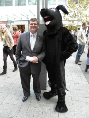 A shot of the Jet Mascot standing next to WA Commerce Minister Simon O